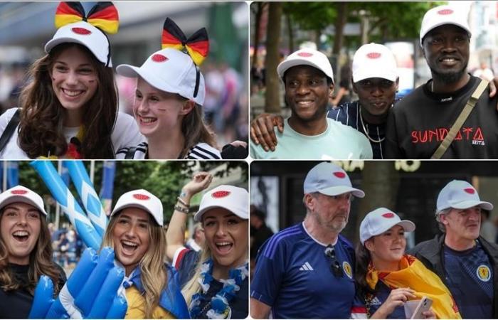 I tifosi di calcio tedeschi distribuiscono cappellini a sostegno di Gaza prima delle partite di EURO 2024